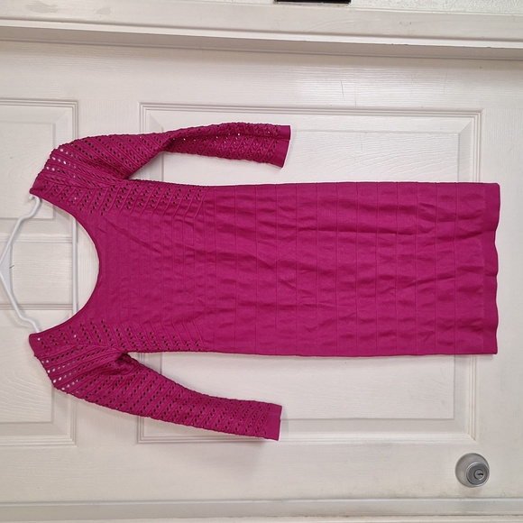 Bebe Ellie Off-The-Shoulder Perforated Bandage Shine Dress in Fuchsia Pink - Picture 5 of 5